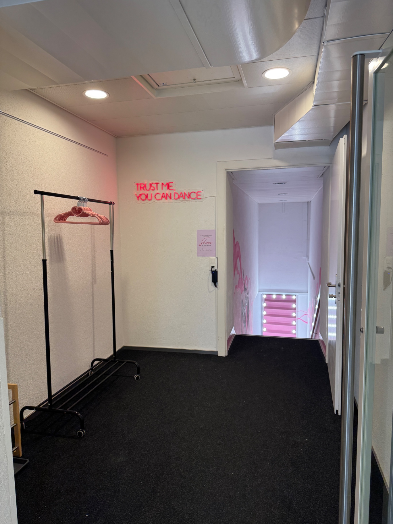 Reception with 'Trust me, you can dance' neon